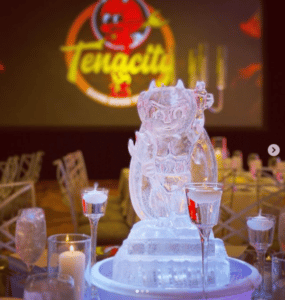 table-top ice sculpture in the shape of a little devil for Torchy's Tacos employee awards event, Tenacity