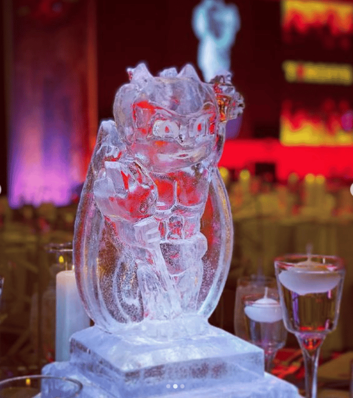 centerpiece ice sculpture of devil baby from Torchy's Tacos