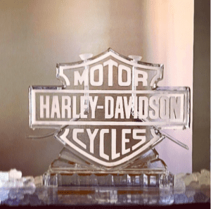 Harley Davidson logo made of ice with two shot luges
