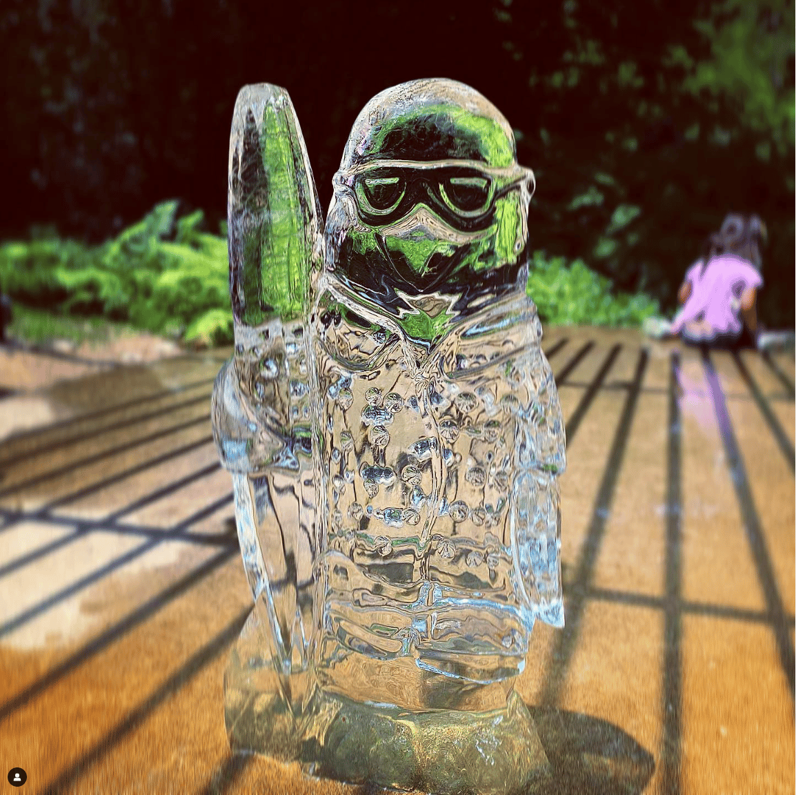 ice sculpture penguin with sunglasses on