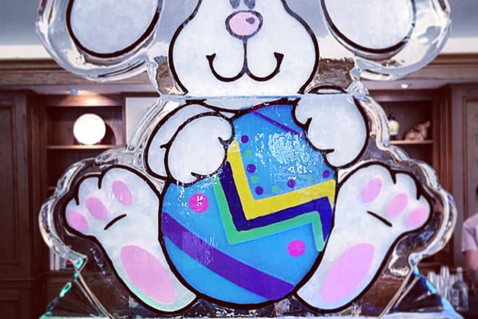 Colorful Easter Bunny holding an egg as an ice sculpture